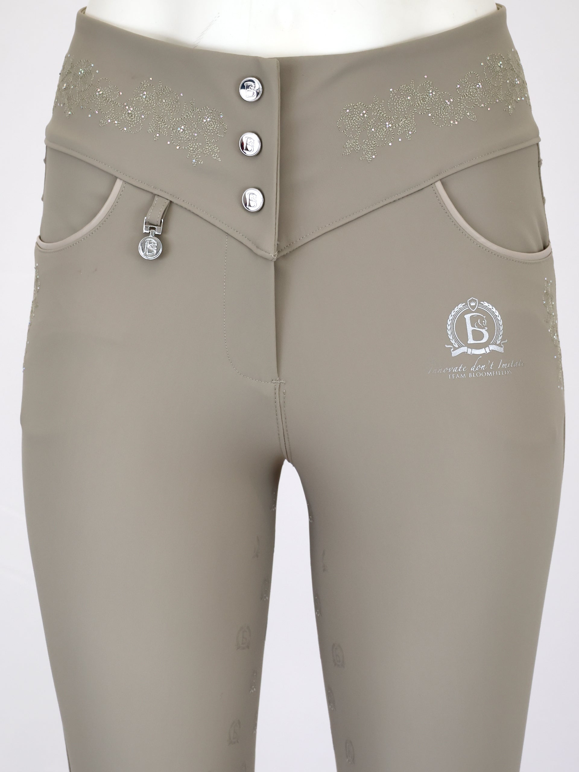 Close-up detail of three-button waistband on the Pearl Anemone Breeches