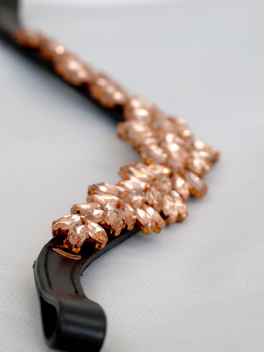 Copper crystal V shape browband on black leather by Team Bloomfields, showing marquise cut rhinestone detail with clear accent stones, available in pony cob and full size