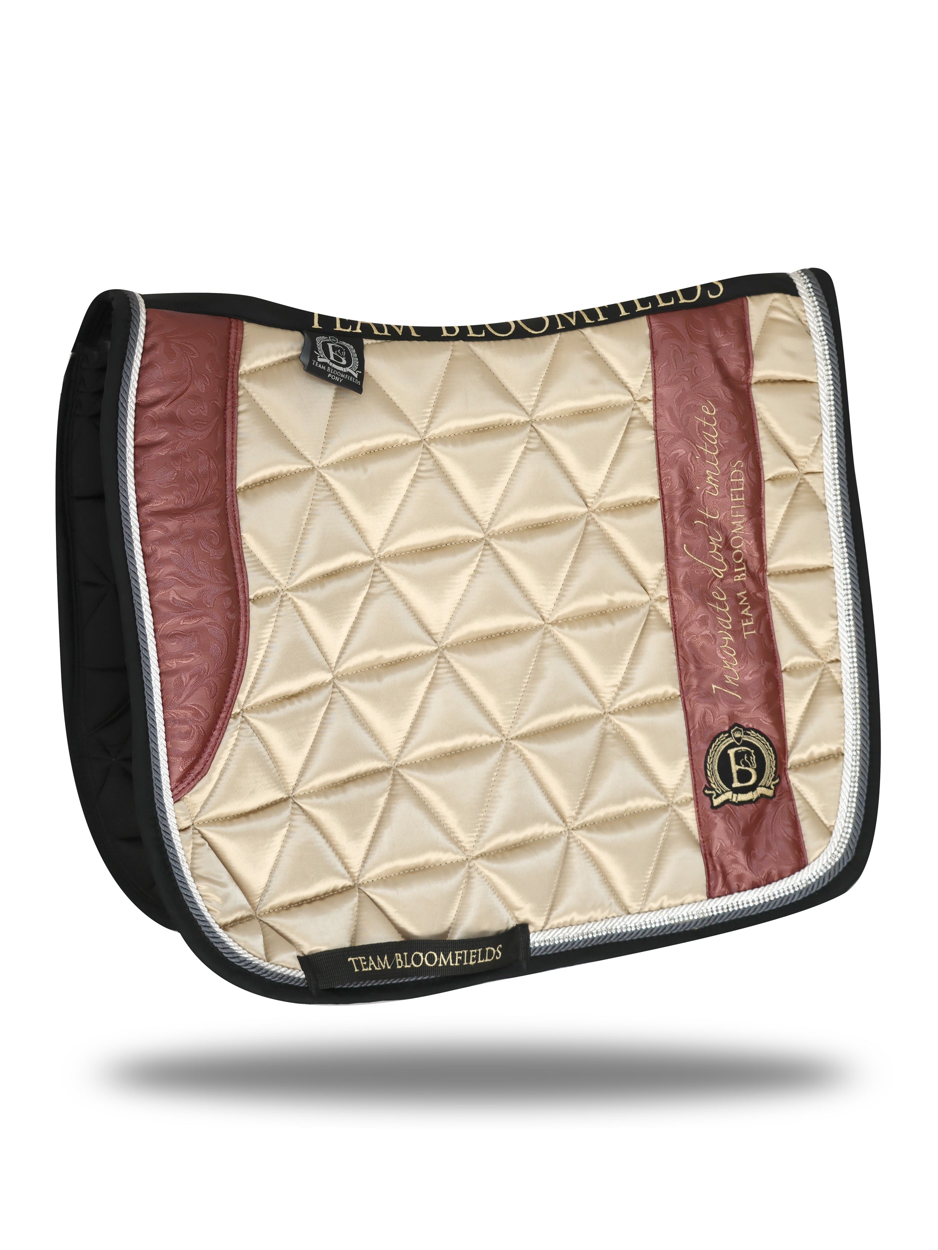 Cream and winter berry paisley dressage saddle pad with intricate paisley print and Bloomfields branding by Team Bloomfields, available in pony cob and full