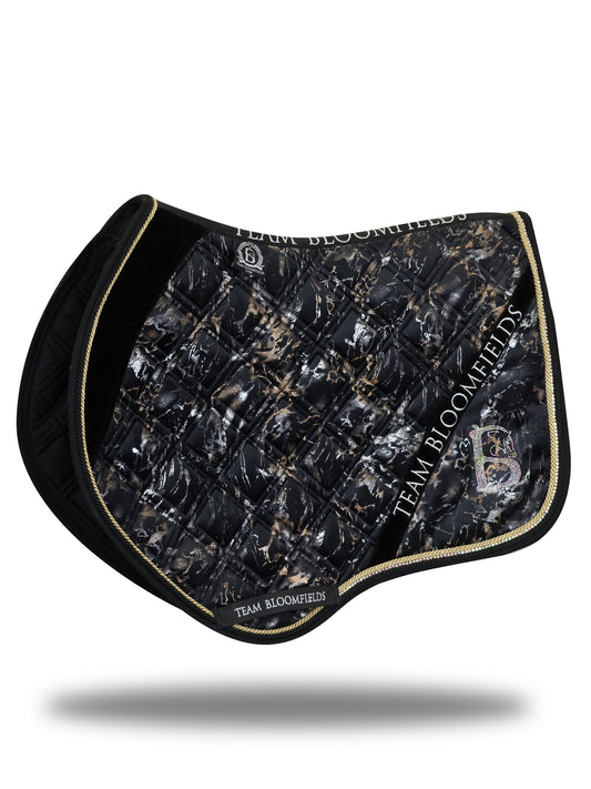Electra black and gold jump saddle pad with marble effect print, gold glitter panel and diamanté Bloomfields B by Team Bloomfields, available in pony cob and full