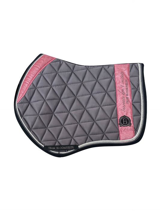 Grey and pink paisley jump saddle pad with decorative paisley print and Team Bloomfields branding, available in pony cob and full