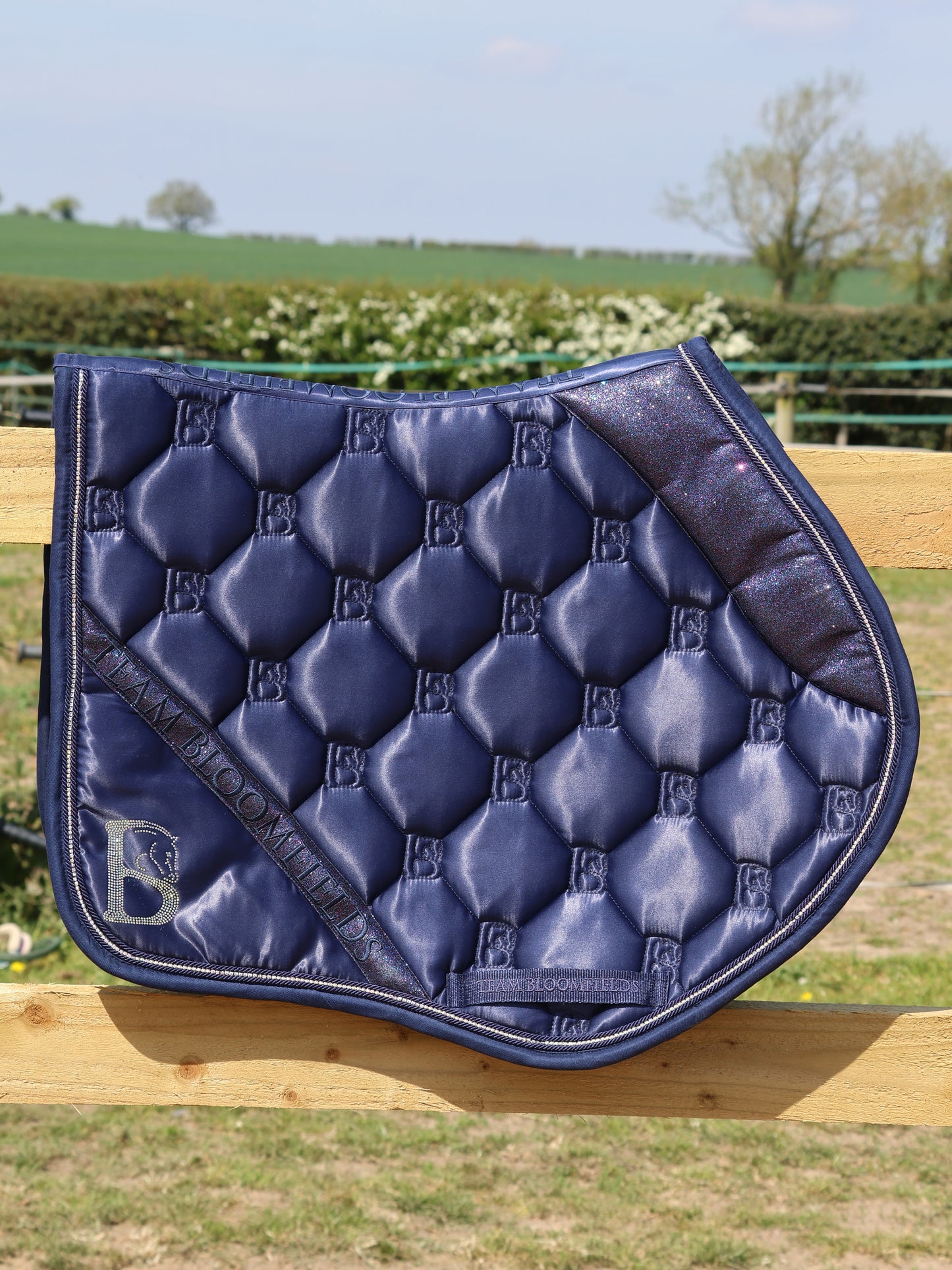Navy sparkle jump saddle pad with tonal navy glitter panel and diamanté Bloomfields B by Team Bloomfields, available in pony cob and full