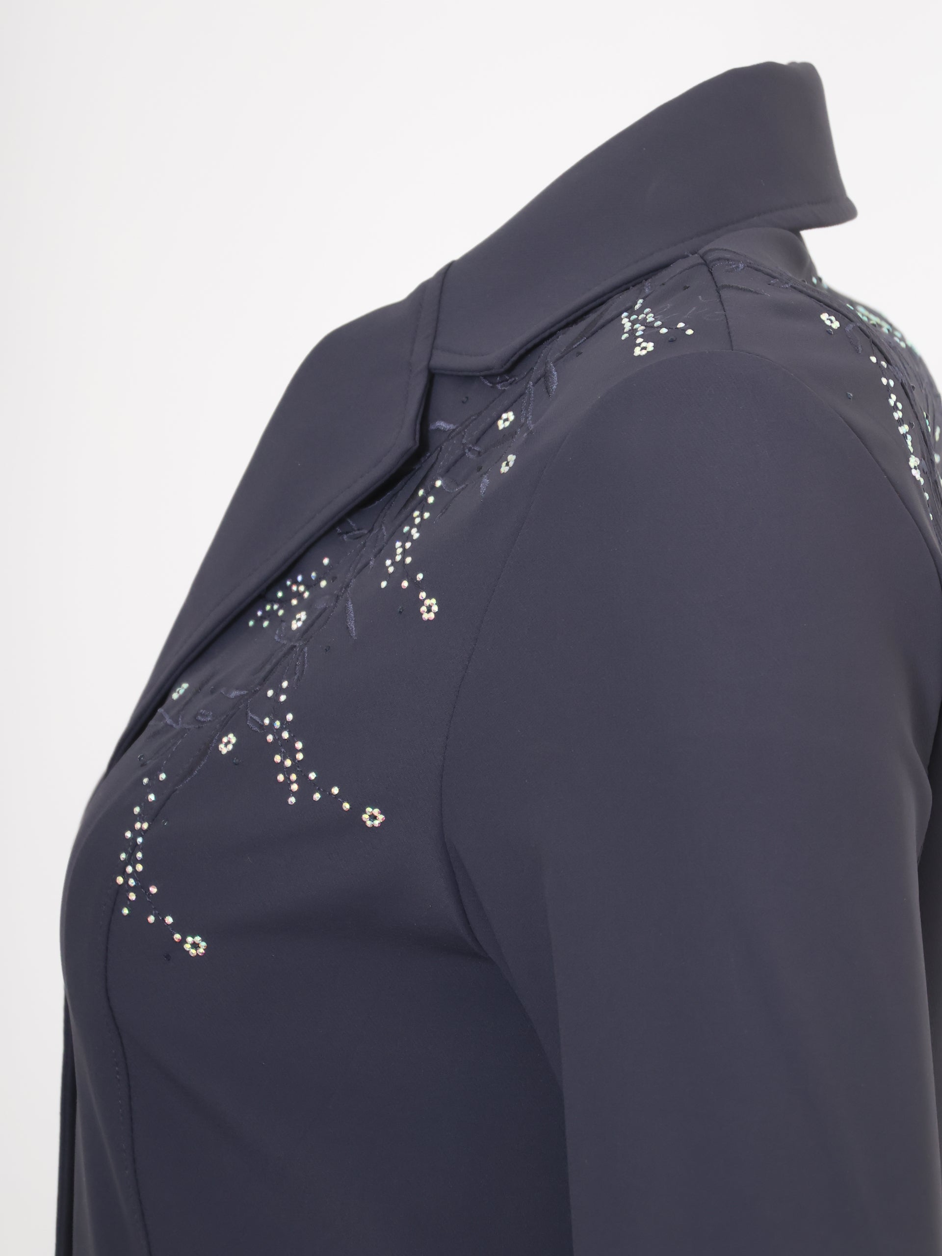 Close-up of embroidered floral vine and crystal embellishment detail on the Navy Vivienne Show Jacket